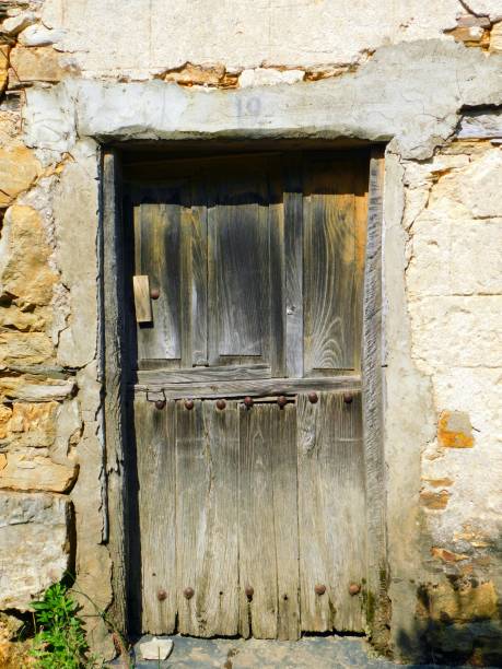 istock ancient door in a rural landscapes 1500887316