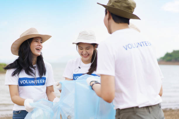 istock Group of volunteer working together. 1500891878