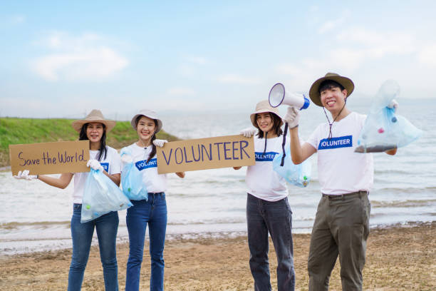 istock Group of volunteer working together. 1500891884