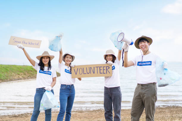 istock Group of volunteer working together. 1500891886