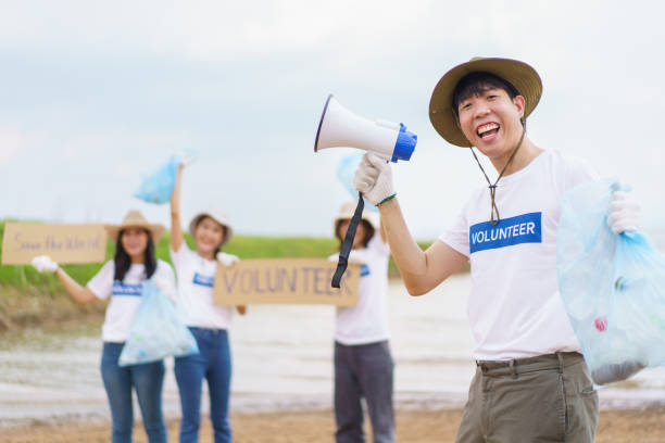 istock Group of volunteer working together. 1500891912