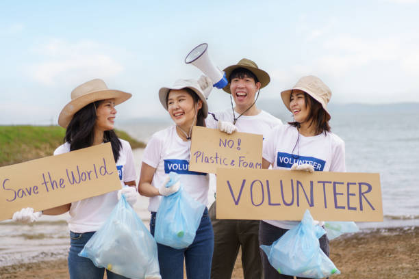 istock Group of volunteer working together. 1500891927