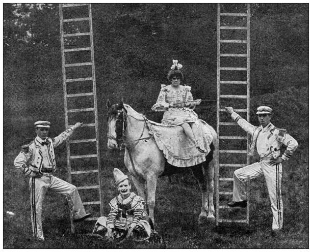antikes bild aus britischer zeitschrift: zirkusartisten - women circus acrobat gymnastics stock-grafiken, -clipart, -cartoons und -symbole