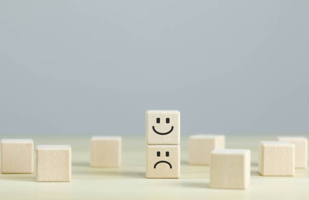 istock smiling faces on wooden blocks 1500896725