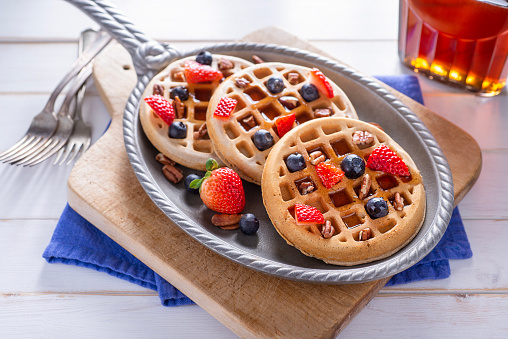 Whole Wheat Waffles with Strawberries, Blueberries and Maple Syrup