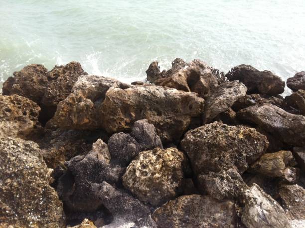 istock Serene coastal landscape featuring a rocky shoreline with crashing waves 1500898653