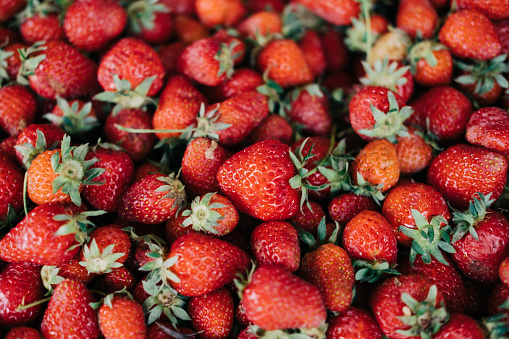 Pile of ripe strawberries close up