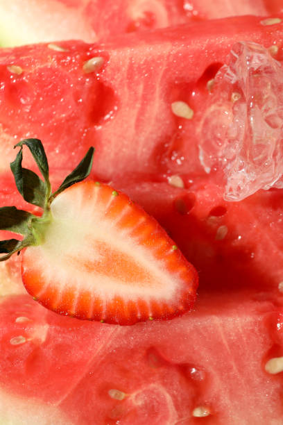 istock Watermelon with strawberry and ice, close up 1500903327