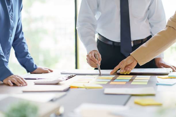 istock Business People brainstorming Meeting Design Ideas use post it notes to share idea professional investor start up project business brainstorming planning in office 1500907012
