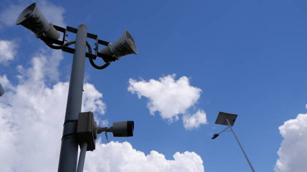 istock loudspeakers and roadside surveillance cameras 1500910367