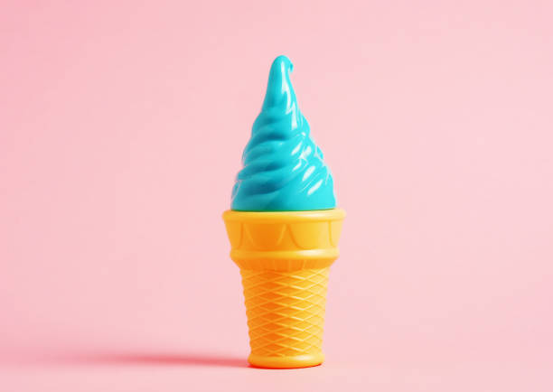 Plastic toy ice cream in waffle cone on pink background. Micro plastic in food concept.