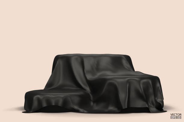 istock Podium covered with a piece of black silk isolated on beige background. Realistic box covered with dark cloth. Podium for product, cosmetic presentation. Creative mock up. 3d vector illustration. 1500918852