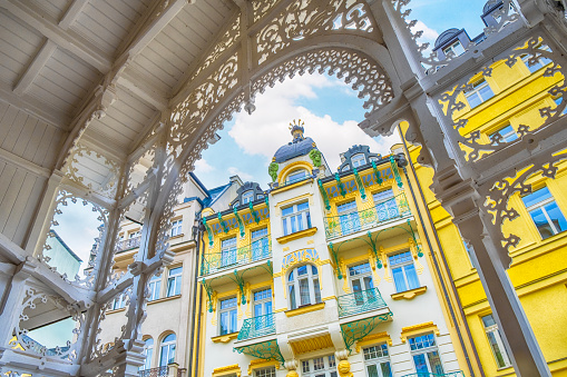 Karlovy Vary (Carlsbad) is a spa town in the west Bohemia region of the Czech Republic. The Market Colonnade was built in 19th century and decorated with various motifs of the lace, carved in wood.