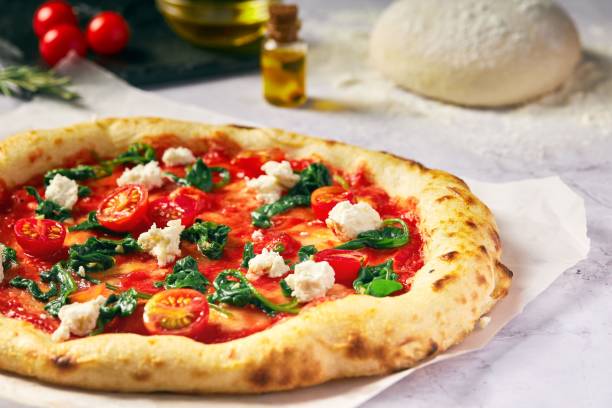 istock there is an image of pizza on the table setting it 1500942809