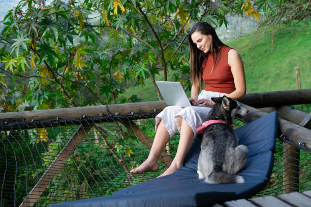istock man and woman using technology in nature 1500945530