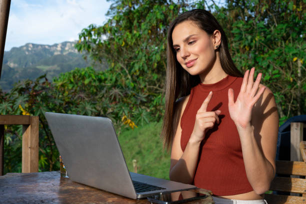 istock man and woman using technology in nature 1500945661