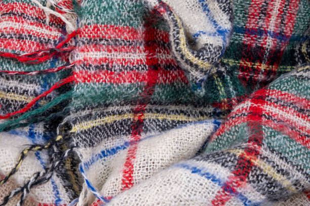 istock Mohair plaid plaid with fringe texture closeup 1500947471