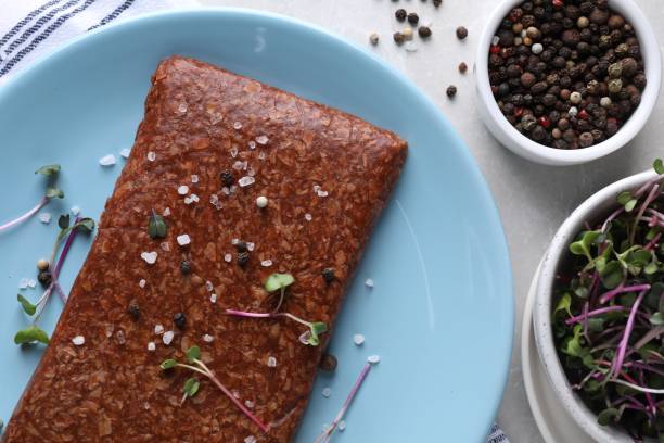 istock Fresh raw vegan mince and spices on white table, flat lay 1500947900