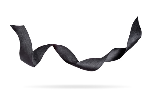 Black satin bow on a white isolated background. toning