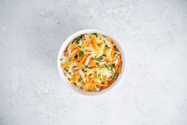 istock Cabbage carrot salad in a bowl 1500954627