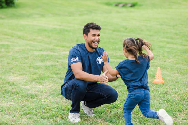 istock Dad has arms open wide as daughter runs toward him 1500955707