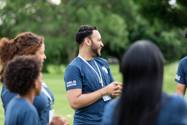 istock Diverse volunteers prepare to work at local park 1500955766