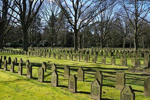 Hamburg, Germany – April 02, 2023: A field of German soldier graves from World War I at Ohlsdorf cemetery in Hamburg, Germany