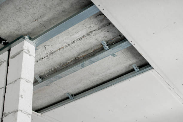 istock Structure with profiles and plasterboard for installation of suspended ceiling 1500961650