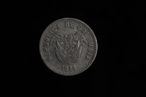 istock Colombian coins in closeup 1500964649