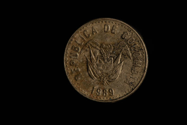 istock Colombian coins in closeup 1500964668