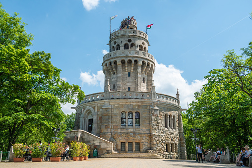 Budapest, Hungary  May 21, 2023. Elizabeth Lookout tower on Janos Hill (Janos-hegy) in Budapest, Hungary. Built in 1911, the tower was named after Empress Elisabeth, wife of Emperor Franz Joseph I. View with people.