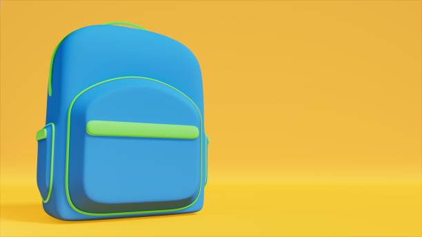 istock Blue backpack for start of class on yellow table, college theme, 3d rendering 1500980495