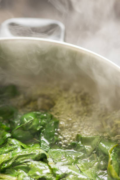 istock closeup of chard and spinach boiled in a steaming pot 1500983136