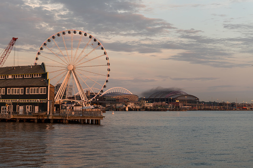 Seattle, USA - Jun 7, 2023: Late in the day the Seattle waterfront skyline just before sunset.
