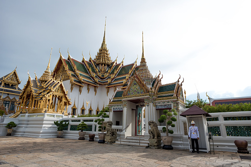 The pavilion was built by King Rama IV as a robing pavilion for the king to change his regalia when entering the Maha Prasat premises.