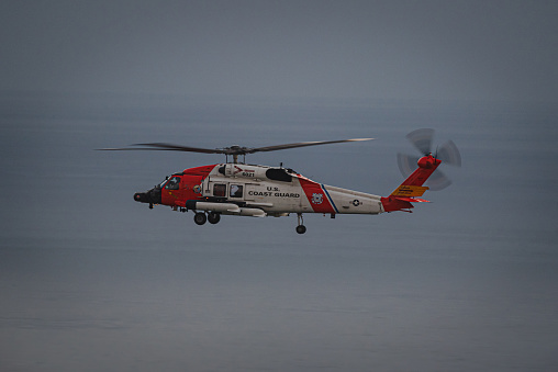 Helicopter of U.S. Coast Guard flying in Torrey Pine Beach Reserve, La Jolla - San Diego County - California