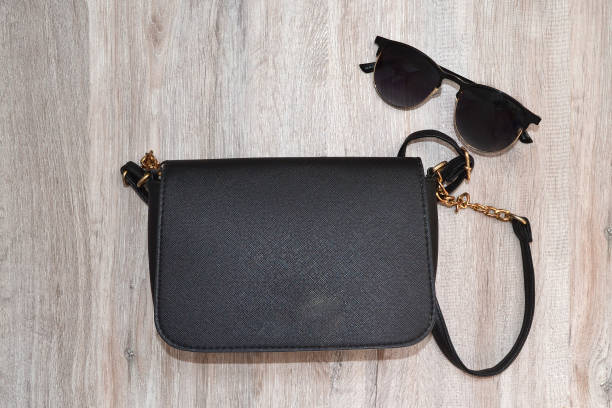 Leather handbag on white background