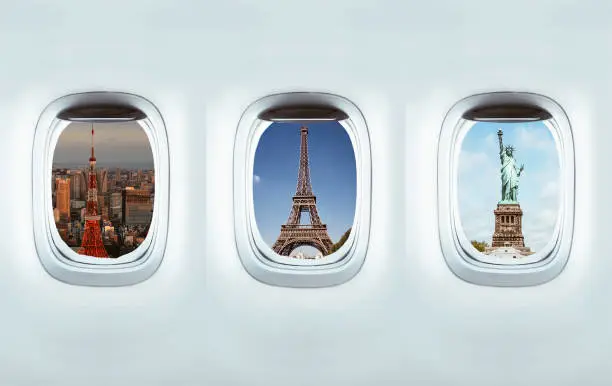 Airplane windows with destination landmarks of Tokyo (Japan), Paris (France) and New York (US). Travel concept.