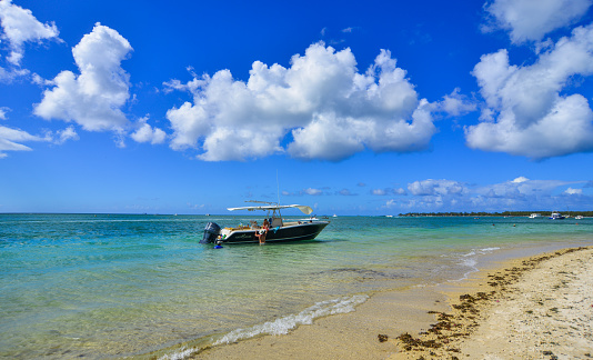 Grand-Baie, Mauritius - Jan 4, 2017. Seascape in summer on Mauritius Island. Mauritius is one of the best destinations,  known for its beaches, lagoons and reefs.