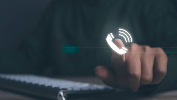 istock CONTACT US, Businessman using computer contact support hotline phone connect. 1501026951