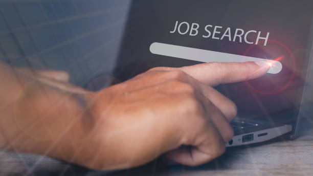 istock Man browsing work opportunities online by laptop computer. Job search. 1501026999