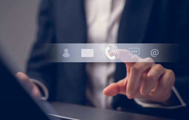 istock CONTACT US concept, Businessman using laptop and hand touching icon customer support, email, message chat and phone. 1501028655