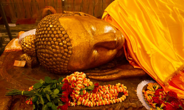 Sleeping buddha statue stock photo