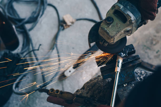 istock Metal working man hand steel grinder 1501052205