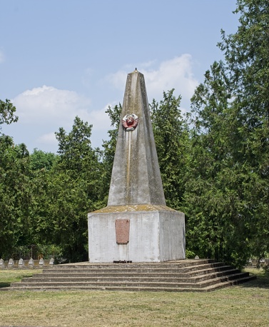 Cece, Hungary - Jun 23, 2023: Soviet Second World War cemetery in Cece. There are around 350 graves here. Soldiers and officers who fell in 1944-1945. Summer sunny day. Selective focus