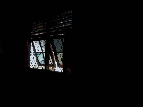 istock light was seen through two windows in a dark room 1501060145