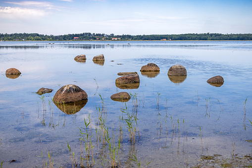 Lake Teletskoye with calm water on a summer day