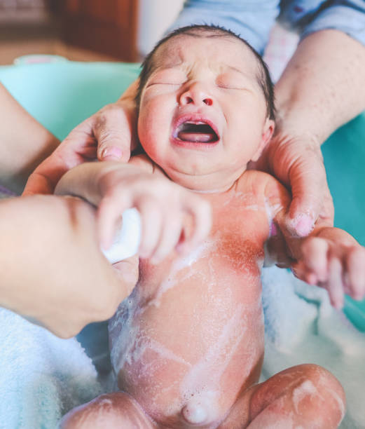 istock Newborn crying in the bathtub 1501073461