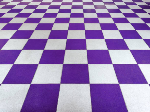 istock Purple and white tiled floor symmetrical with a grid texture in perspective perspective for a permanent tiled floor background. red white square Made of ceramic material for flooring 1501074440
