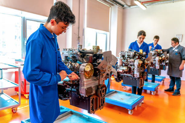 istock Group Of Students Studying For Auto Mechanic Apprenticeship At Vocational Education 1501081664
